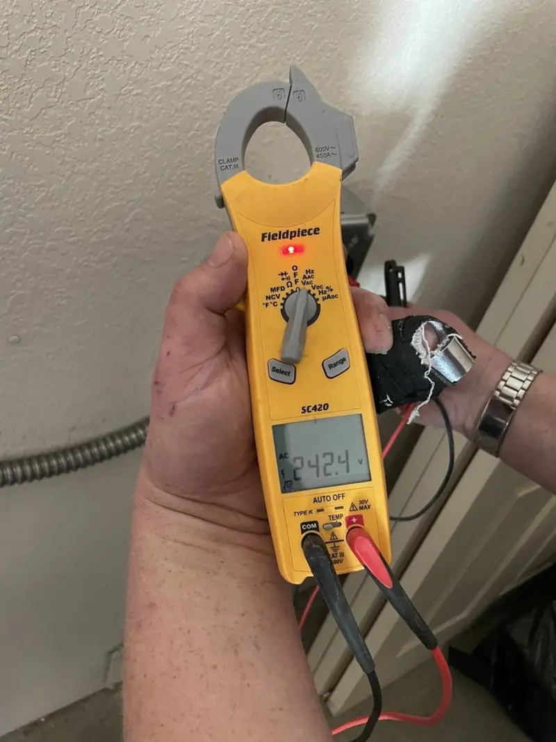 Voltage testing with clamp meter during Outlet Installation in Soddy-Daisy